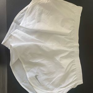 White Nike shorts